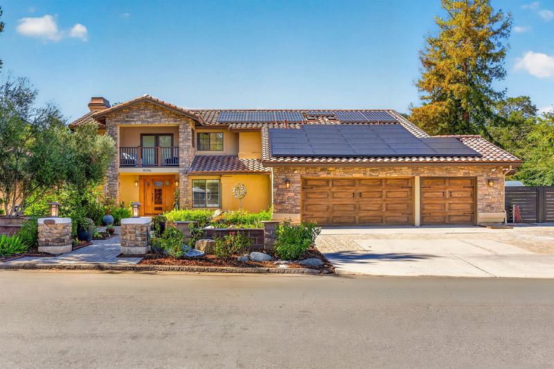 Street view of the front elevation with roof mounted solar