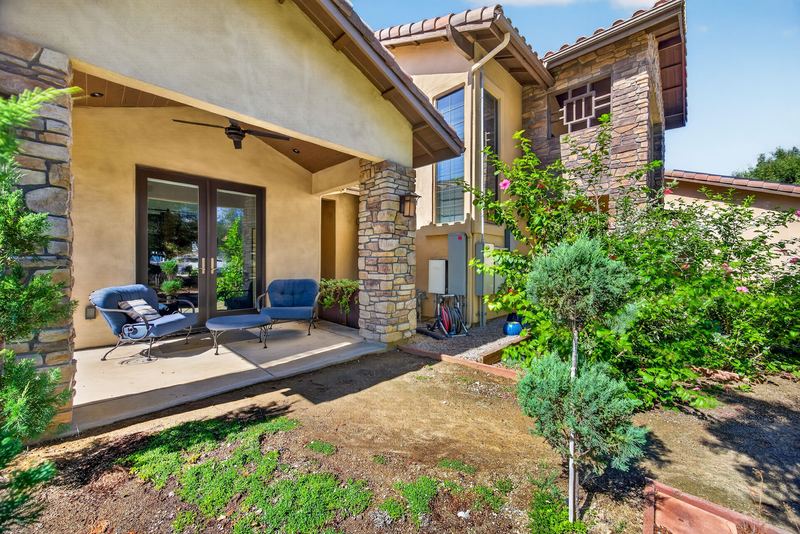 Covered patio off the house with seating
