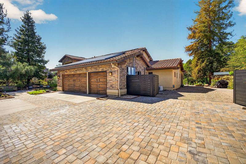 Paver motor court and three car garage
