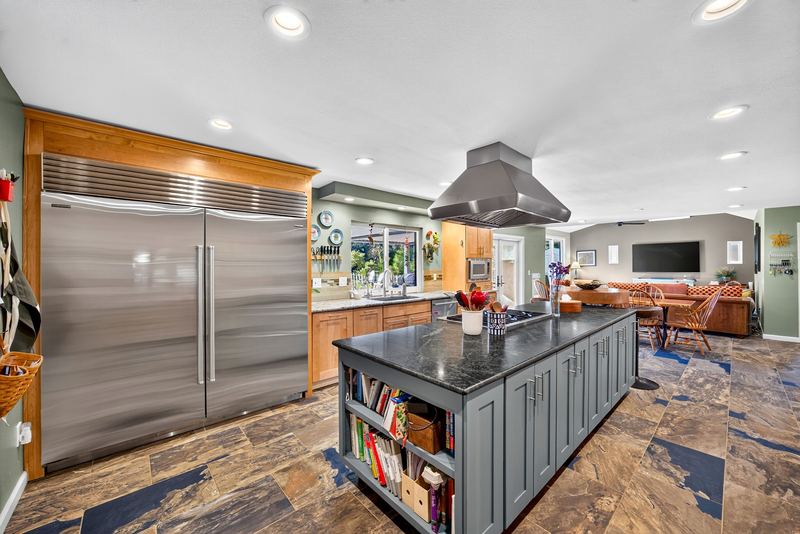 Kitchen with Subzero refrigerator and centre island