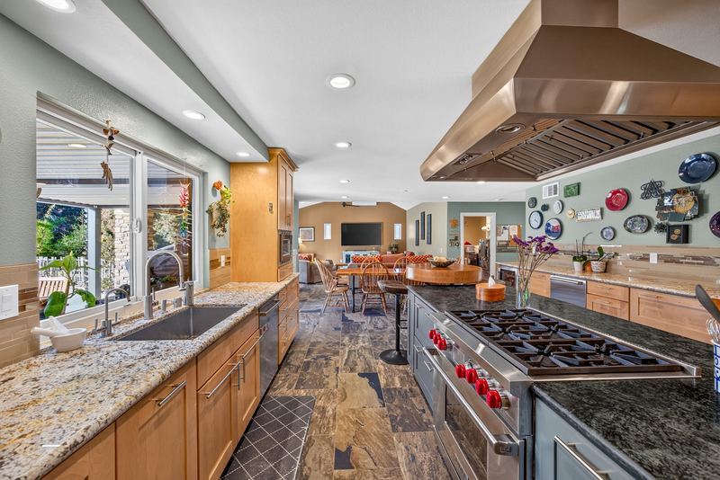 Kitchen with granite counters and slate flooring