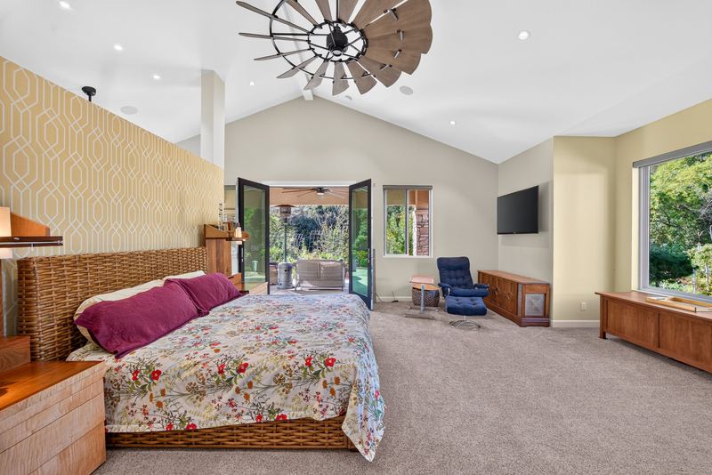 Bedroom with garden doors opening to a patio