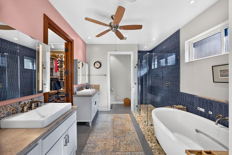Bathroom with freestanding tub and vanity